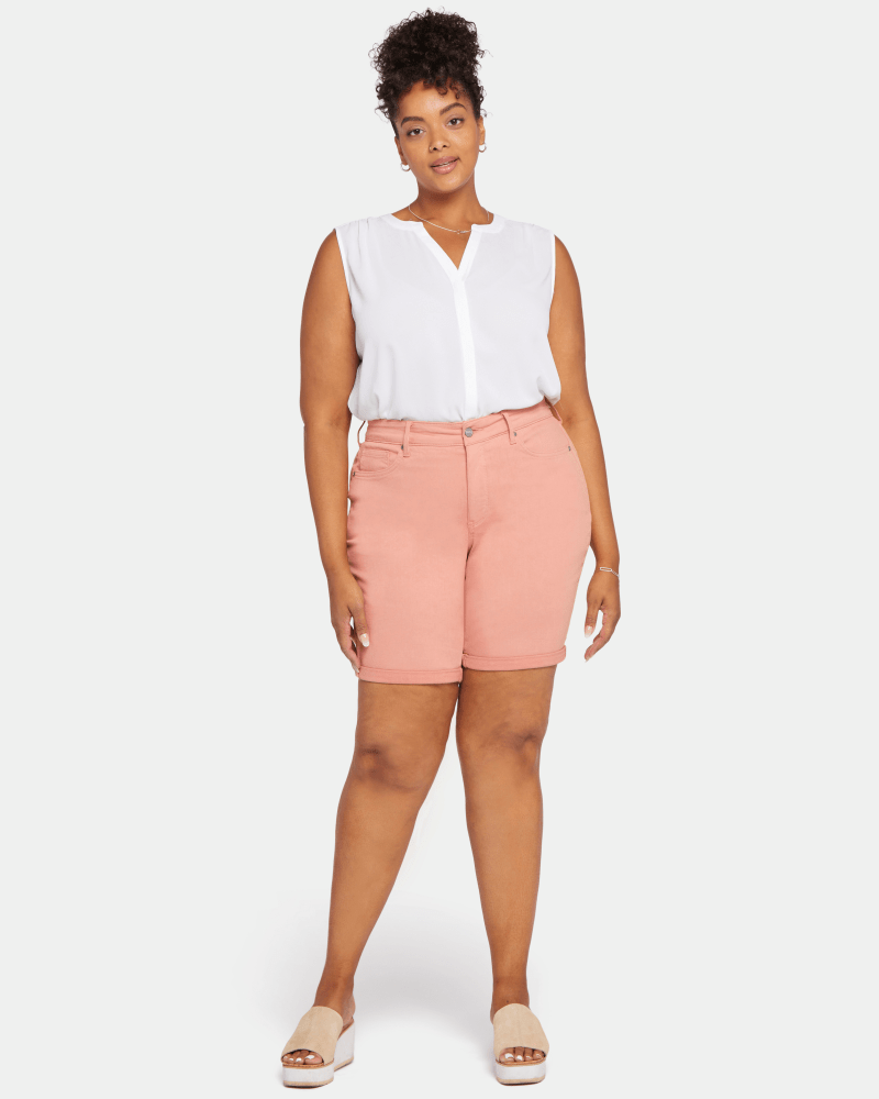 Front of a model wearing a size 14 Ella Rolled Cuff Bermuda Short in Terra Cotta by NYDJ. | dia_product_style_image_id:200342